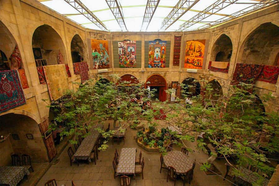 Baku: Old City Guided Walking Tour - Shirvanshahs Palace: Divanhane, tombs, mosques, and the power of layout