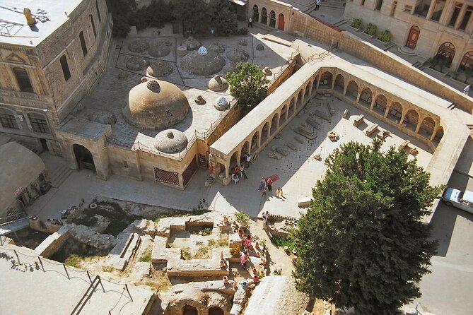 Group Walking Tour in Baku Old City - Caravanserai and the miniature-book museum: trade routes and tiny scale